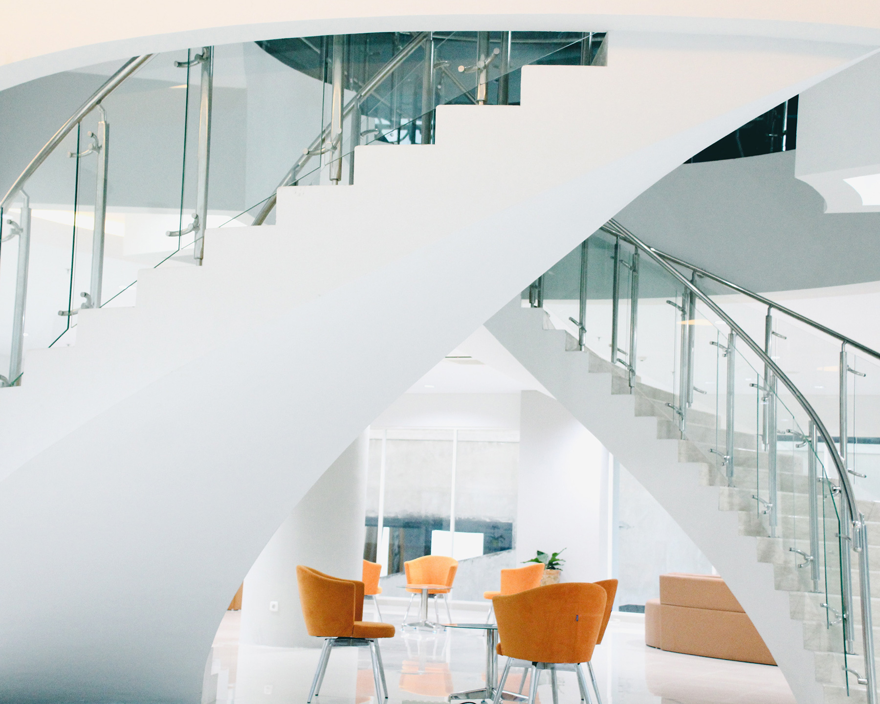 Bright modern office interior with sculptural stair